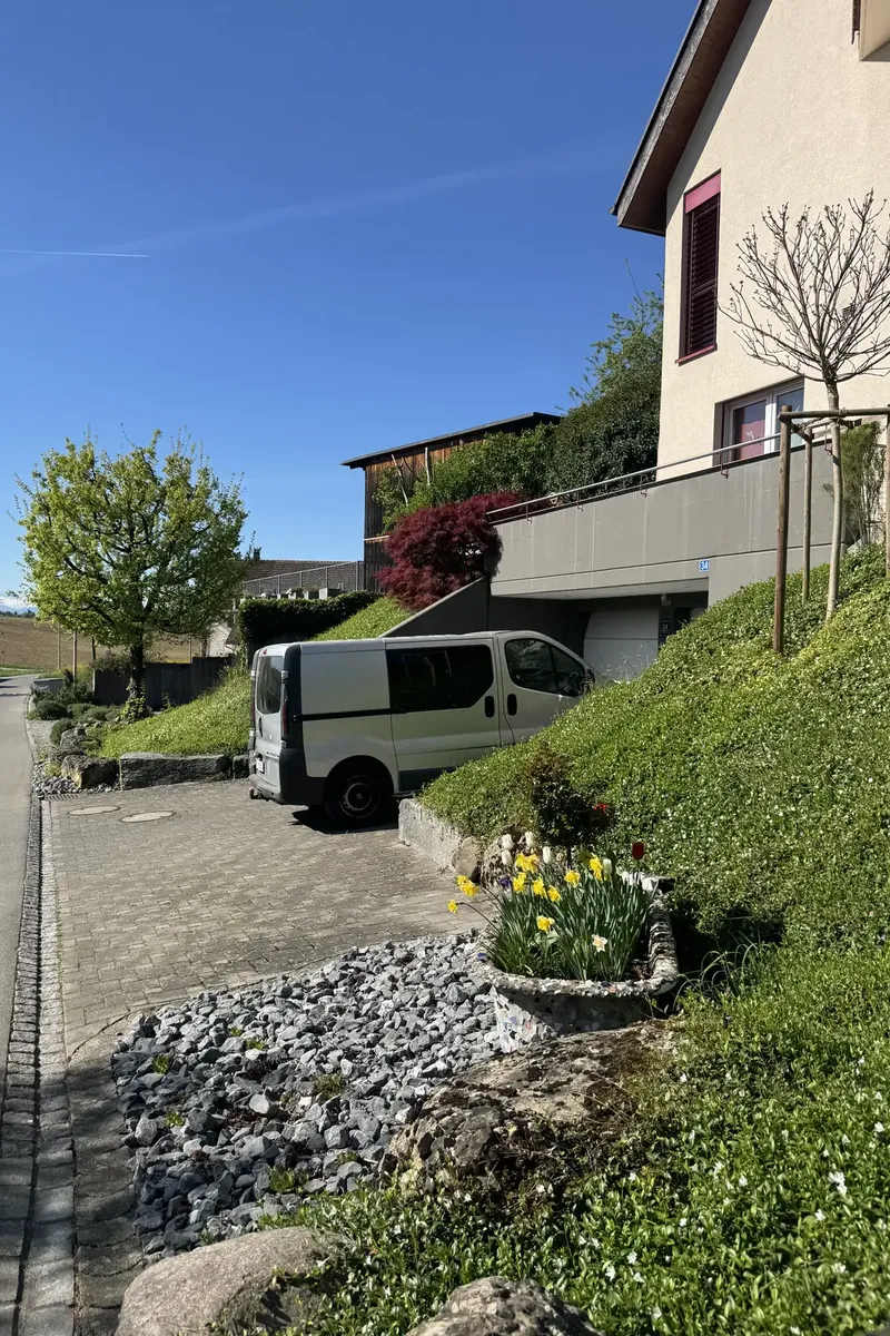 Well-kept grounds with service vehicle